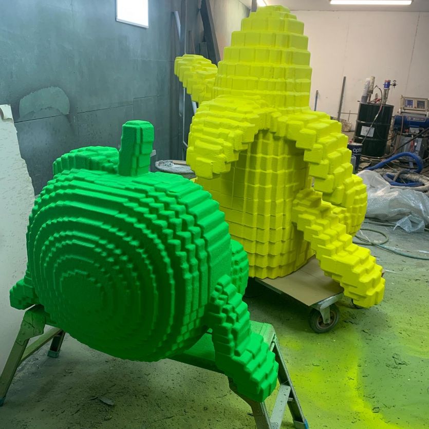 Giant pixelated fruit models 