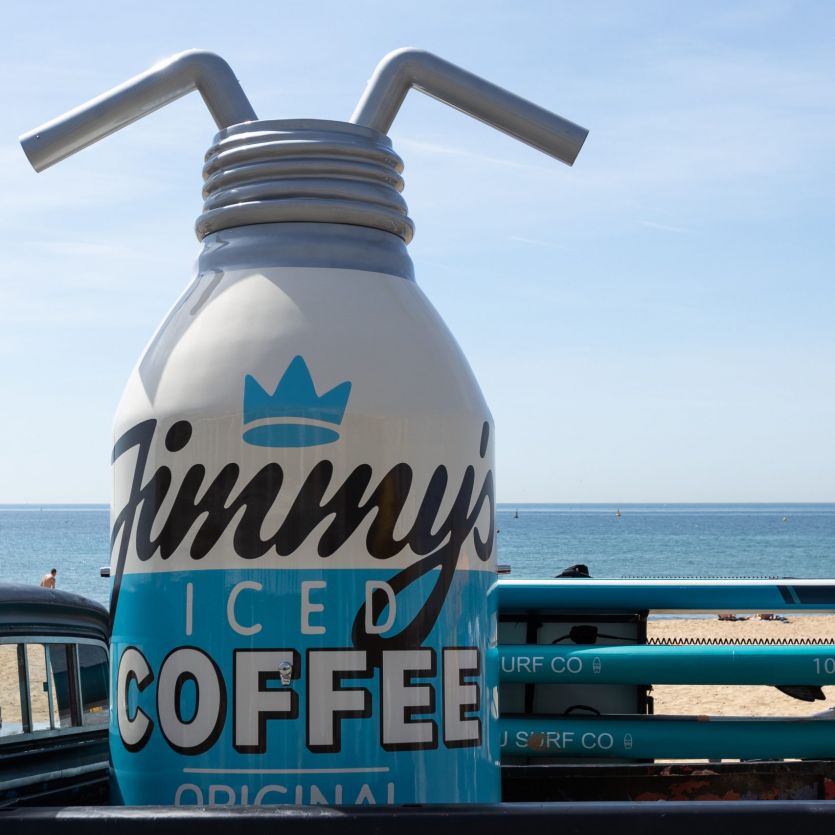 Giant Jimmy's iced coffee beach shower prop