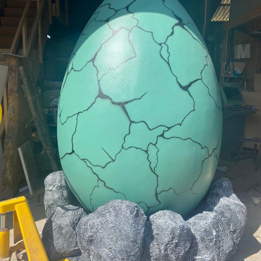 Giant green airbrushed dino egg prop