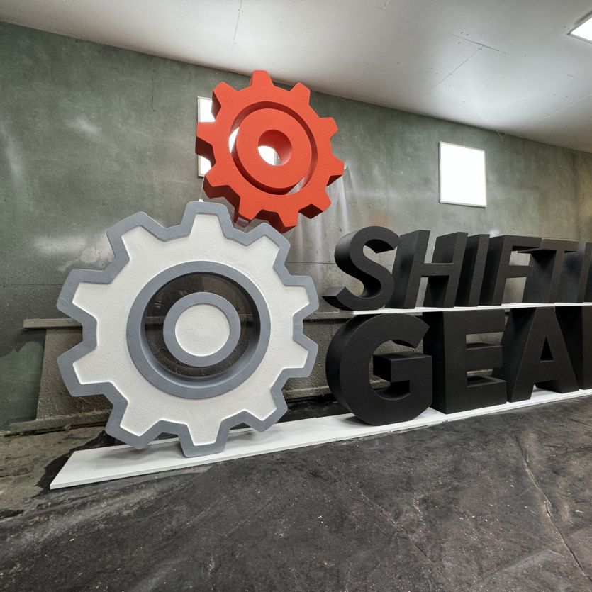 Large 3d letters and logo Shifting gears 