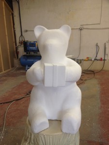 Polystyrene shaped Panda with present