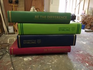 Giant stack of books prop we created