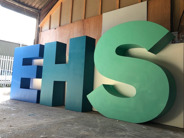 large 3d letters in blue